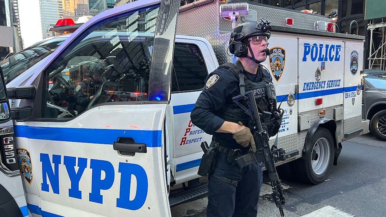 Four people, including a New York City off-duty police officer, were killed.