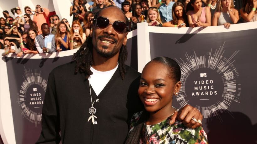INGLEWOOD, CA - AUGUST 24: Recording artist Snoop Dogg (L) and Cori Broadus attend the 2014 MTV Video Music Awards at The Forum on August 24, 2014 in Inglewood, California. (Photo by Christopher Polk/Getty Images for MTV)