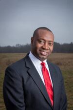 Dr. Marshall Shepherd, photos taken in a field on South MIlledge.  Some taken with umbrellas.