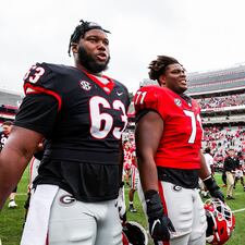 Georgia offensive lineman Sedrick Van Pran (63), Georgia offensive lineman Earnest Greene III (71) after Georgias G-Day spring scrimmage on Dooley Field at Sanford Stadium in Athens, Ga., on Saturday, April 16, 2022. (Photo by Tony Walsh)