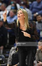 STORRS, CT - MARCH 21: Head coach Katie Abrahamson-Henderson of the UCF Knights signals to her team as they take on the UConn Huskies during the second round of the 2022 NCAA Women's Basketball Tournament held at Harry A. Gampel Pavilion on March 21, 2022 in Storrs, Connecticut. (Photo by Sean Elliot/NCAA Photos via Getty Images)